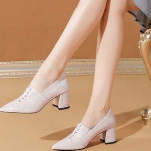 A pair of small leather shoes